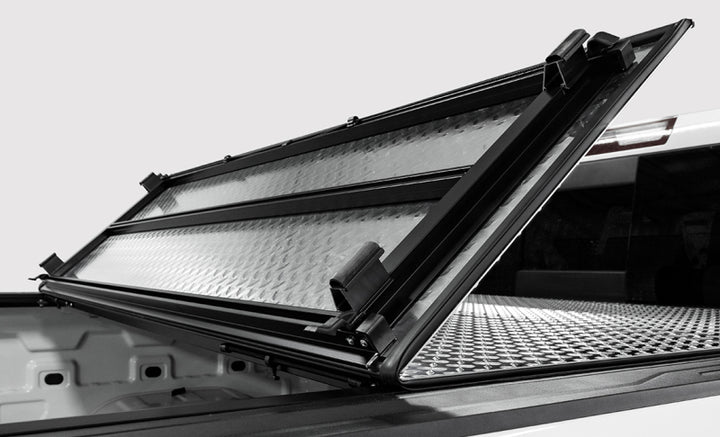 Access LOMAX Tri-Fold Cover 04-14 Ford F-150 6ft 6in Bed - Carbon Fiber Finish