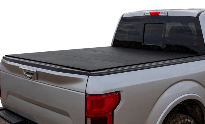 Access LOMAX 2022+ Rivian R1T 4ft 6in Bed (w/ OEM Tonneau Track) Folding Hard Cover - Black Urethane