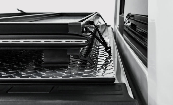 Access LOMAX 2022+ Rivian R1T 4ft 6in Bed (w/ OEM Tonneau Track) Folding Hard Cover - Carbon Fiber